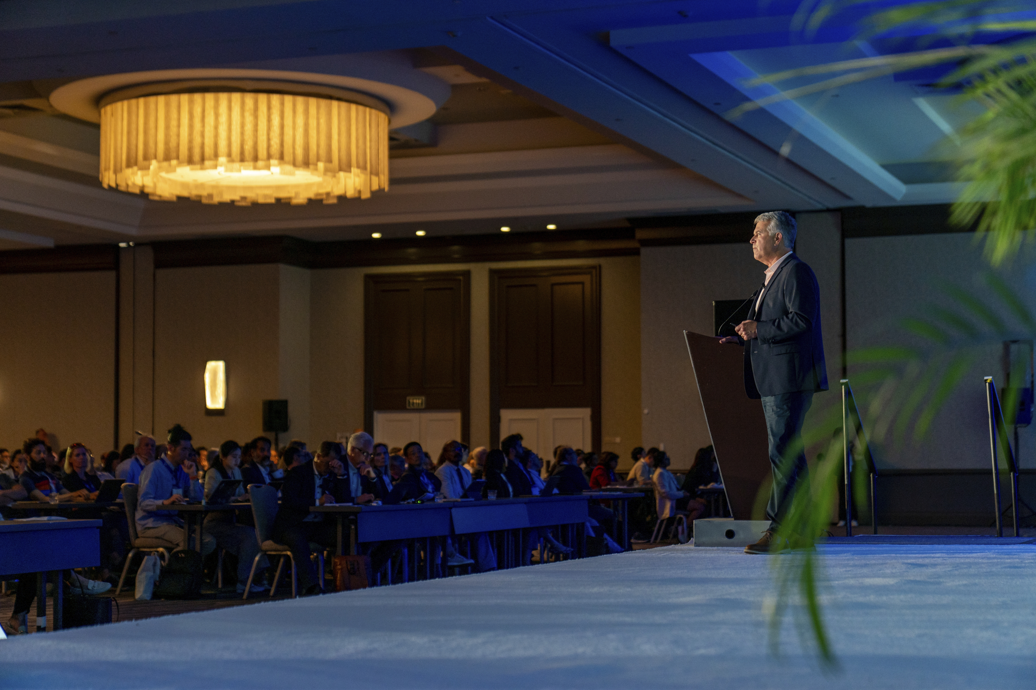 A speaker presentation to a crowd at TIDES USA