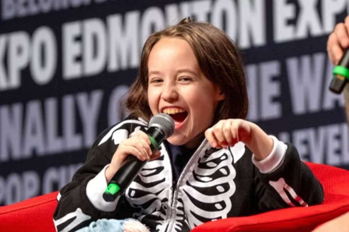 Vivien Lyra Blair smiles on stage