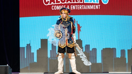 A cosplayer is on stage during the Cosplay Craftsmanship Cup at CALGARY EXPO 2023.