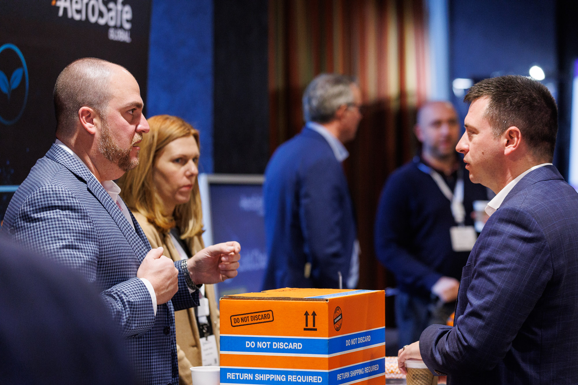 Three trade and channel professionals network at pharma industry networking at Trade and Channel