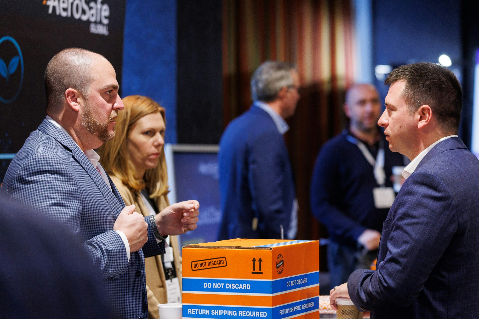 Three trade and channel professionals network at pharma industry networking at Trade and Channel