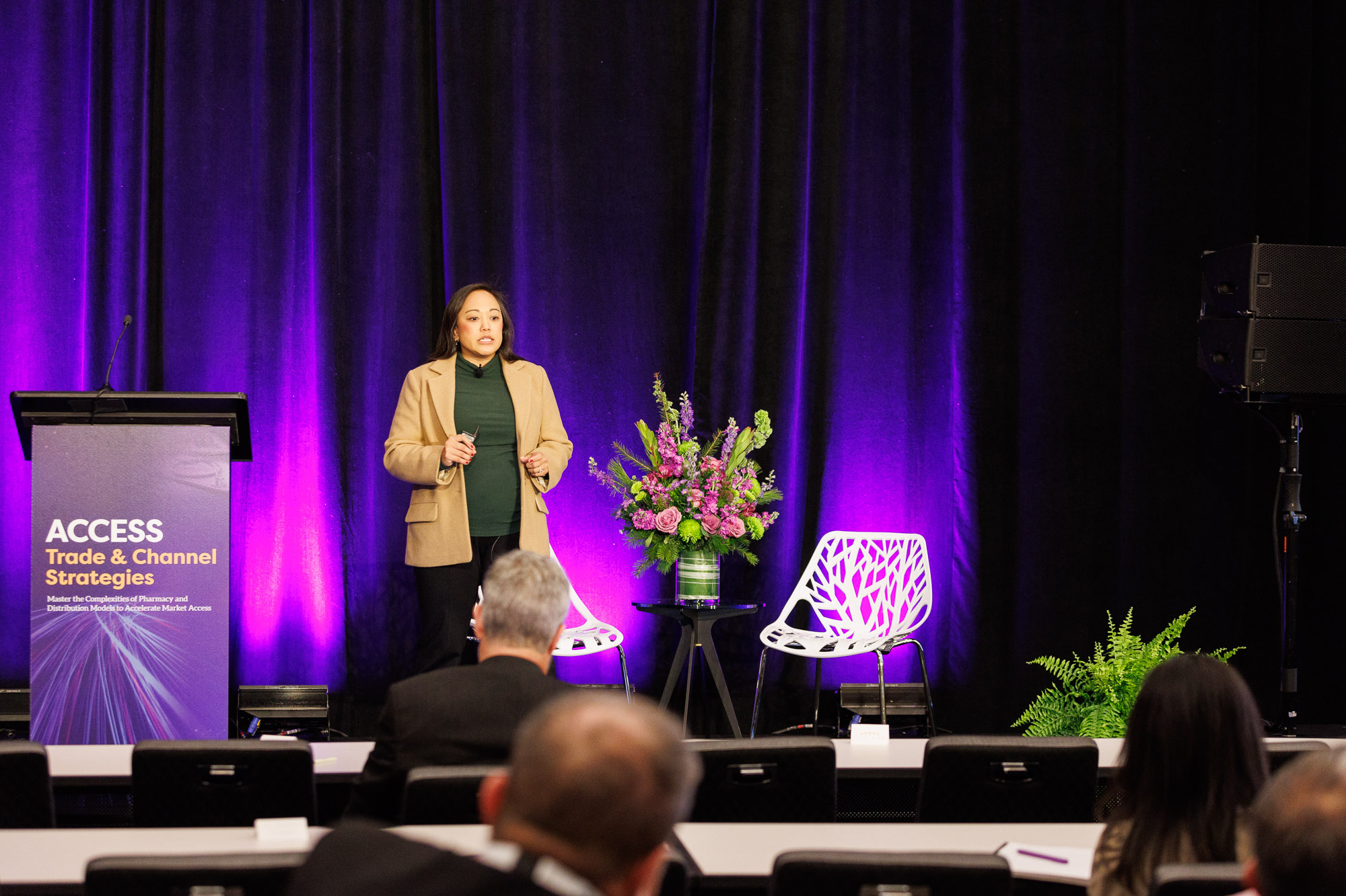 A leading pharma industry presenter delivers a speech at Trade and Channel Strategies