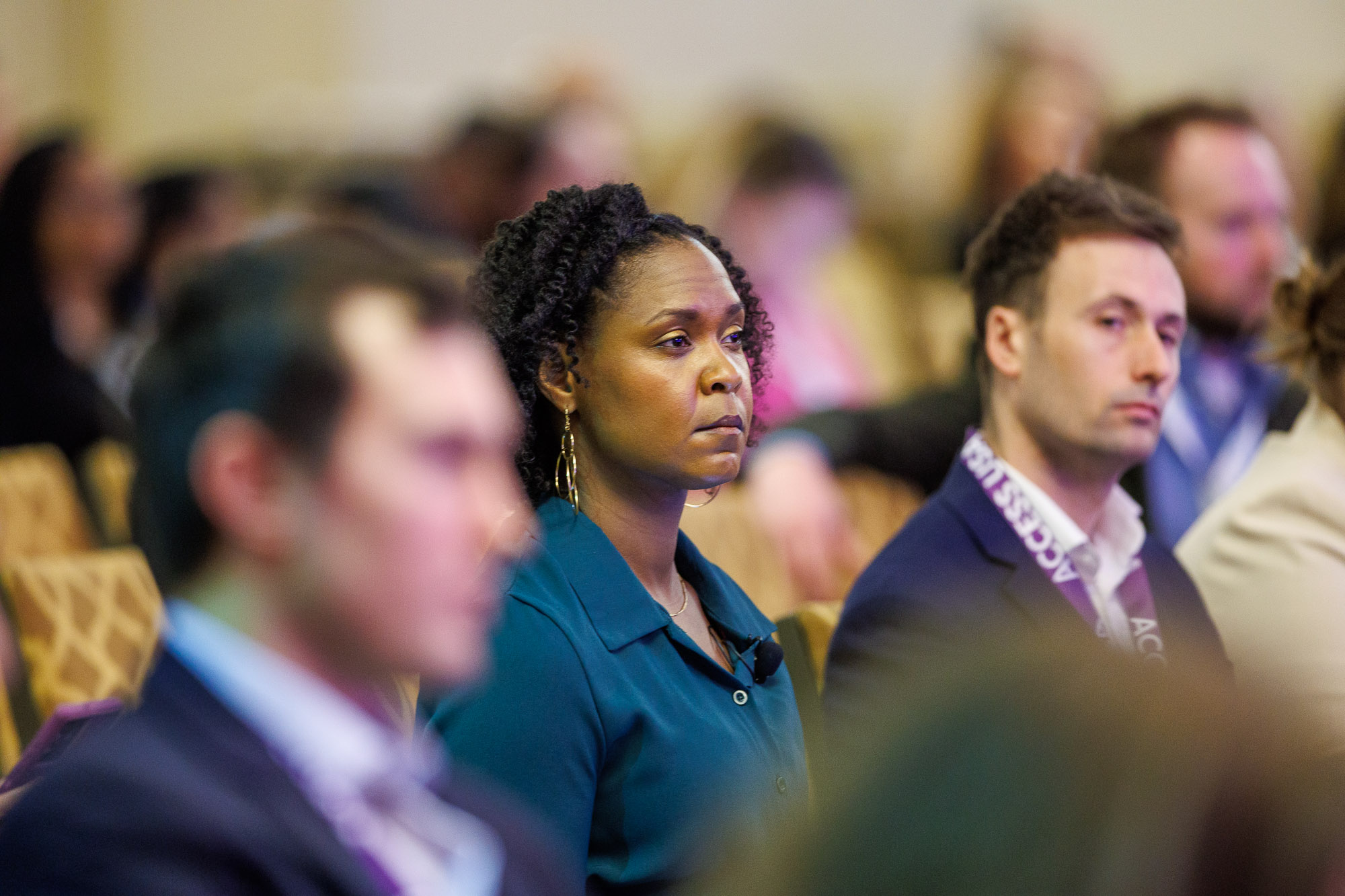 Close up of a pharmaceutical professional at Patient Assistance & Access Programs conference
