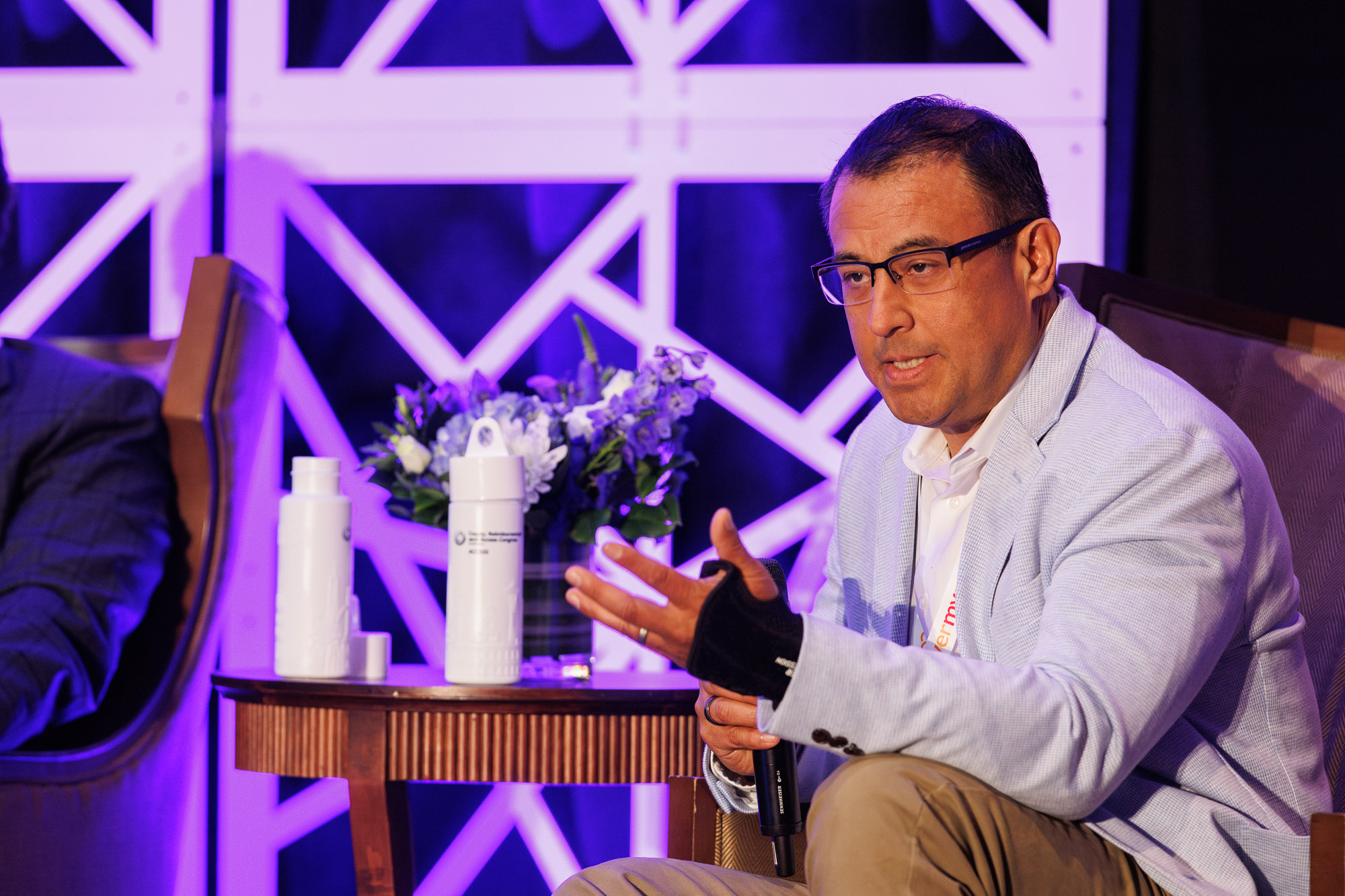 Pharma expert delivering insights at patient access conference