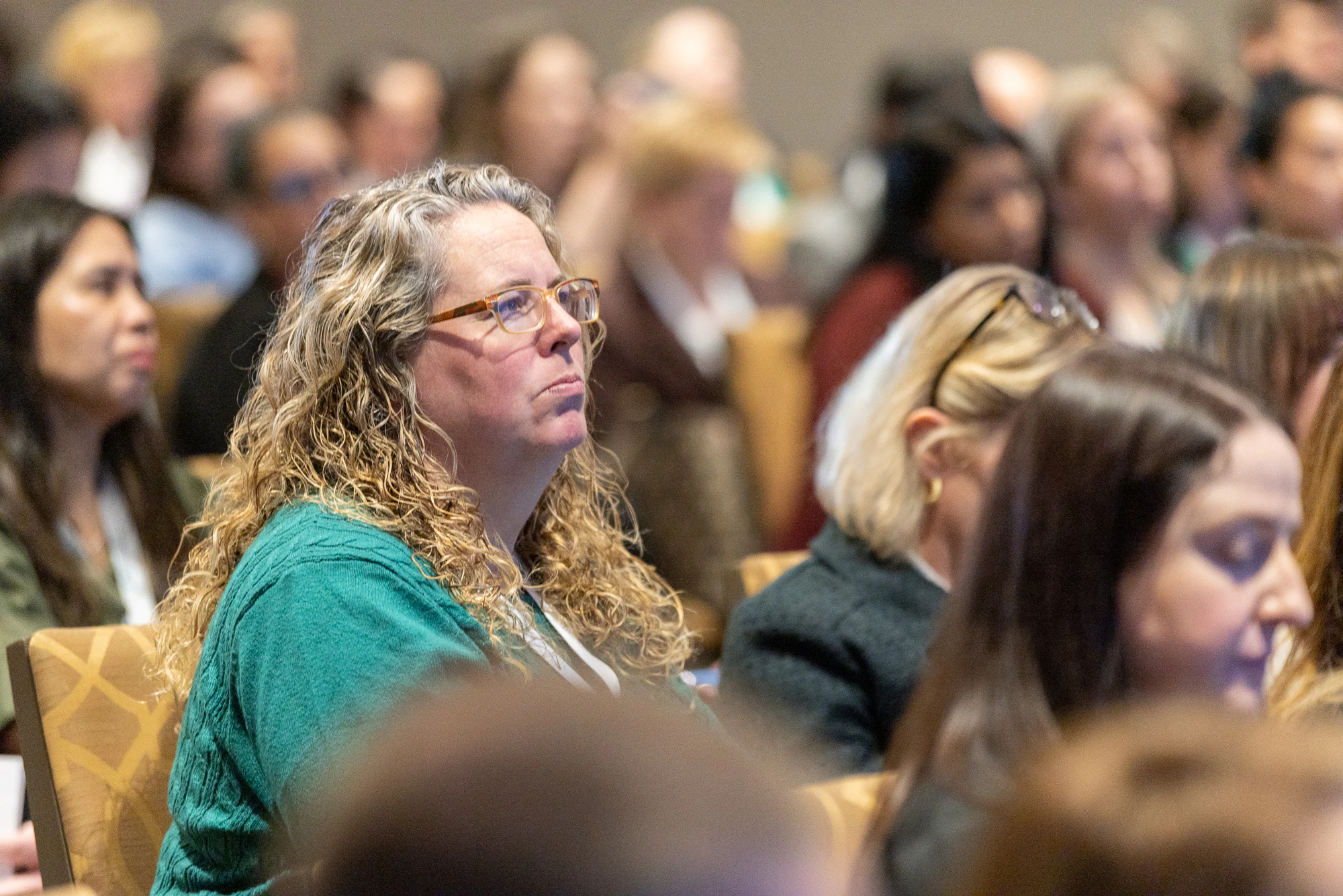 Audience member listening intently at Hub and Specialty Pharmacy Models East