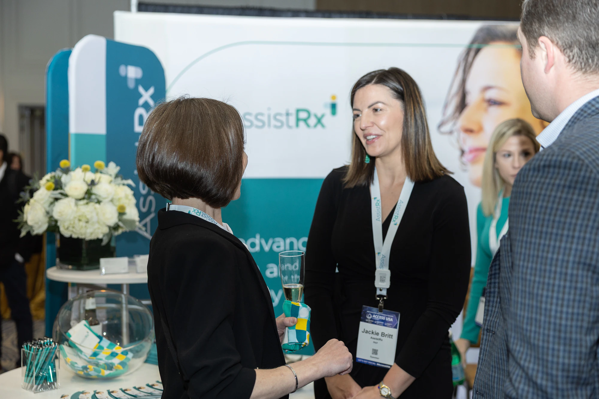 Attendees networking in exhibit hall at Hub and Specialty Pharmacy Models East