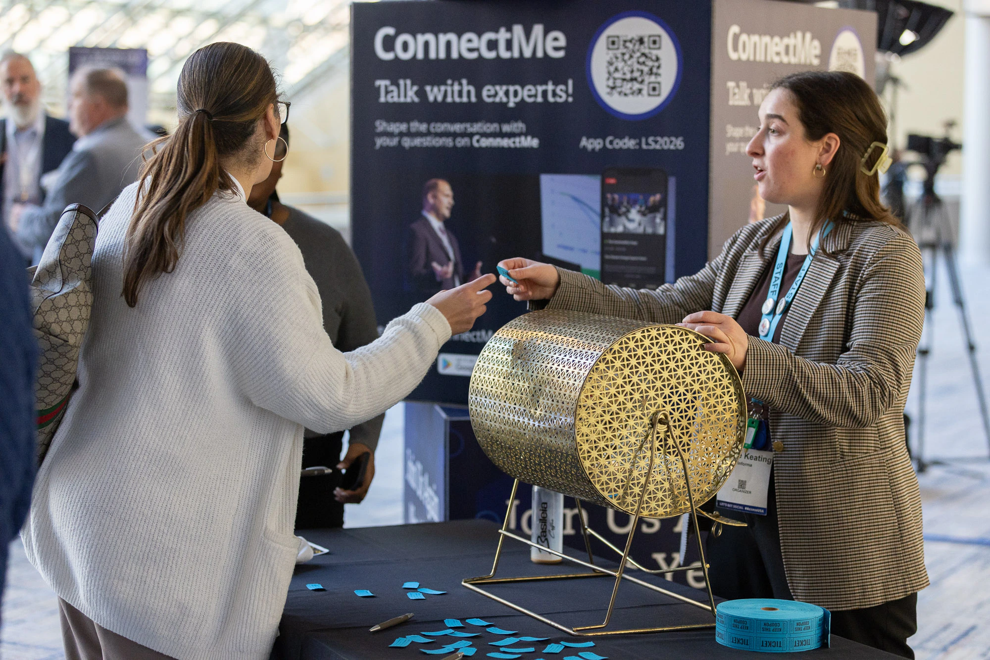 Pharmaceutical professionals entering raffle at Access USA