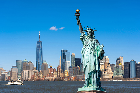 The Statue of Liberty over the Scene of New york cityscape