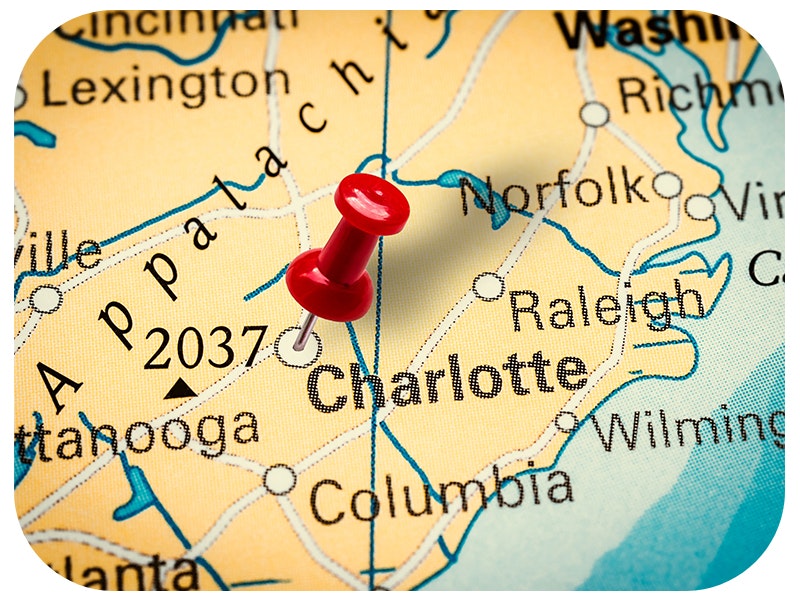 Pushpin pointing at Charlotte city in North Carolina, America