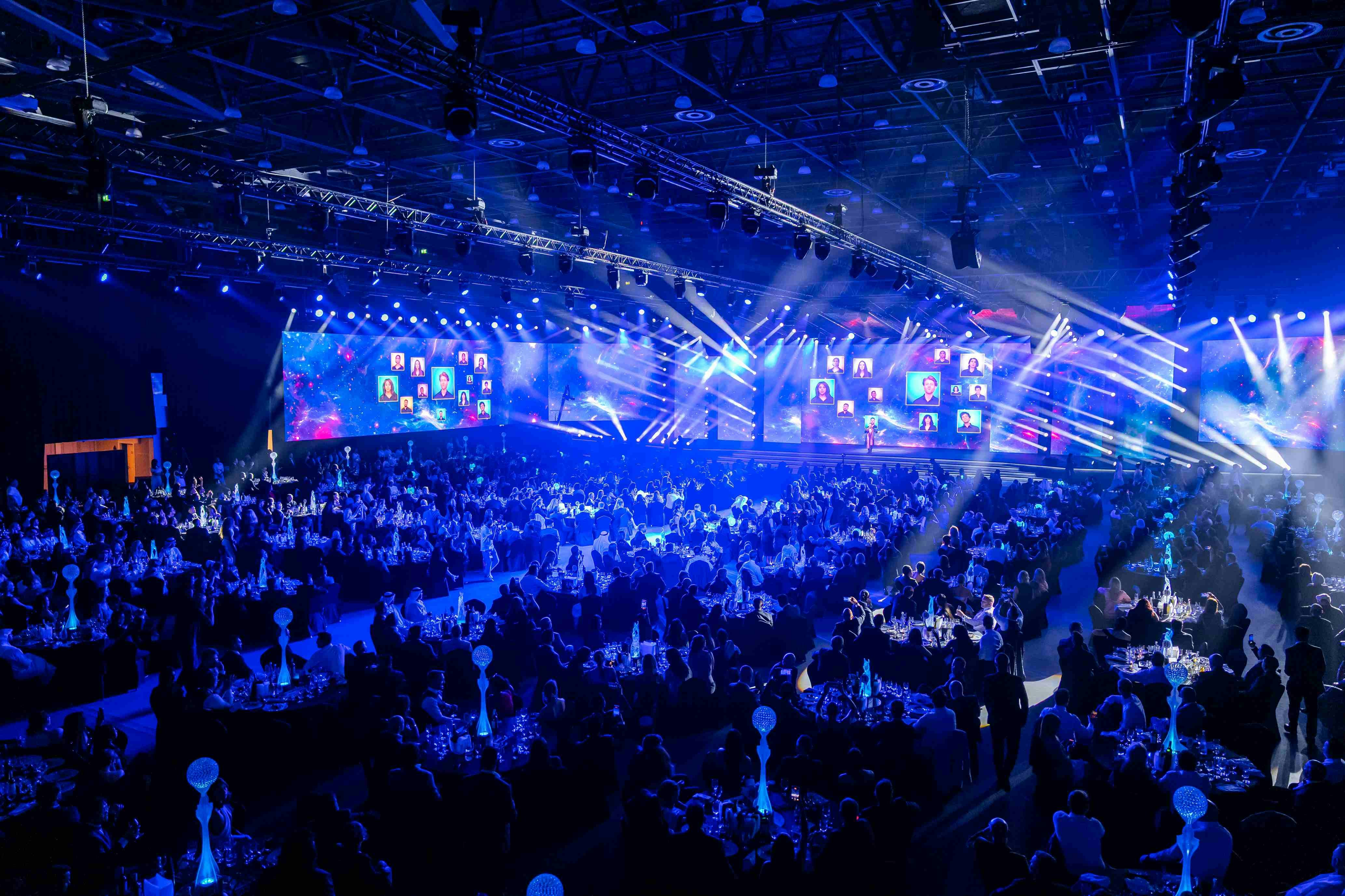 Middle East Event Awards ceremony with a large audience, immersive stage lighting, and live award presentations recognising leading event agencies and professionals in the Middle East.