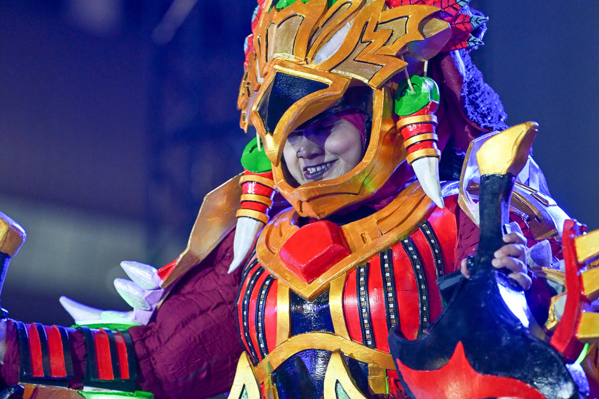 A cosplayer showcasing their costume during the Cosplay Catwalk at MEFCC.