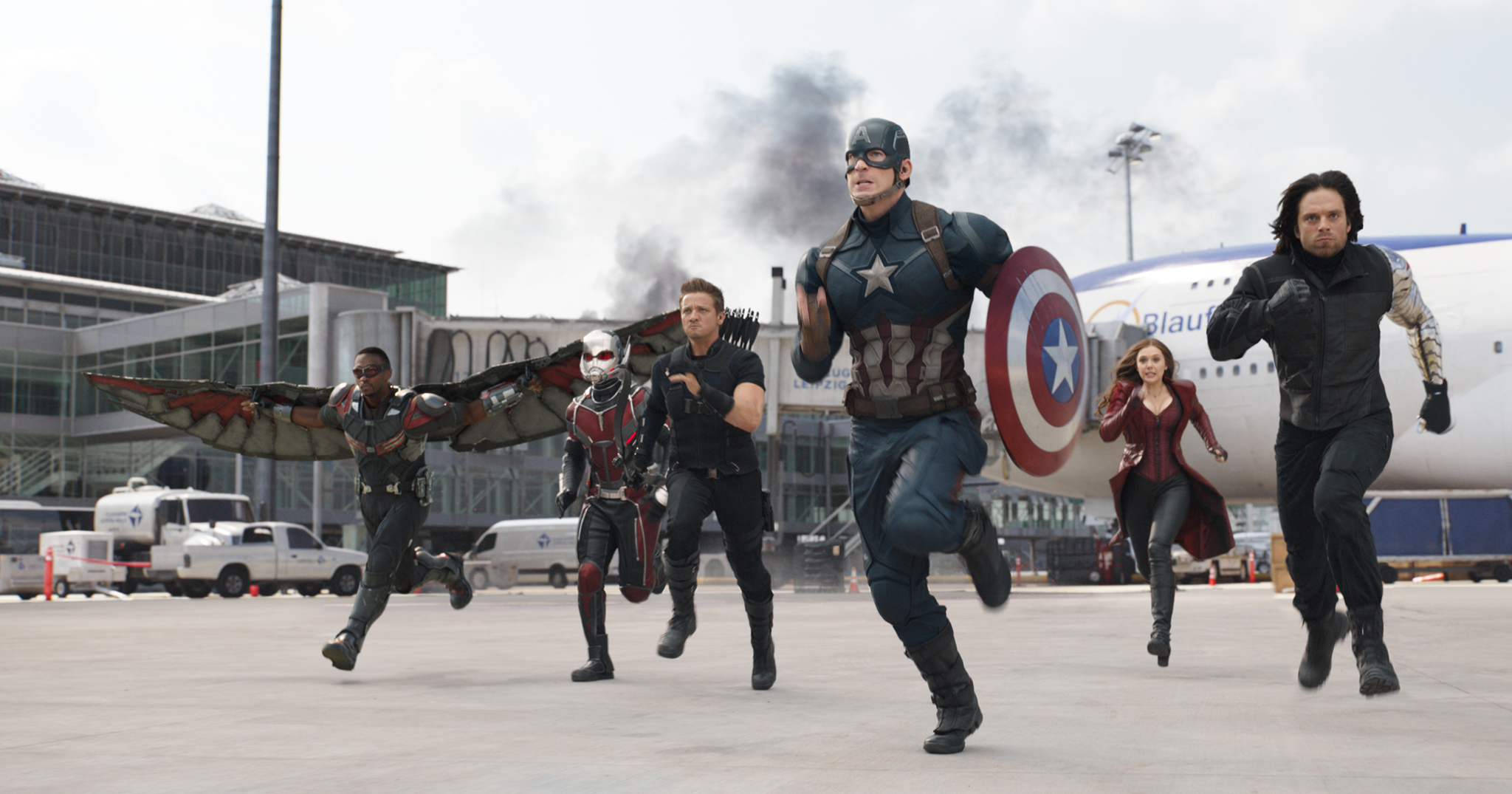 Falcon, Antman, Hawkeye, Captain America, Scarlet Witch, and The Winder Solider are running into battle at the airport base