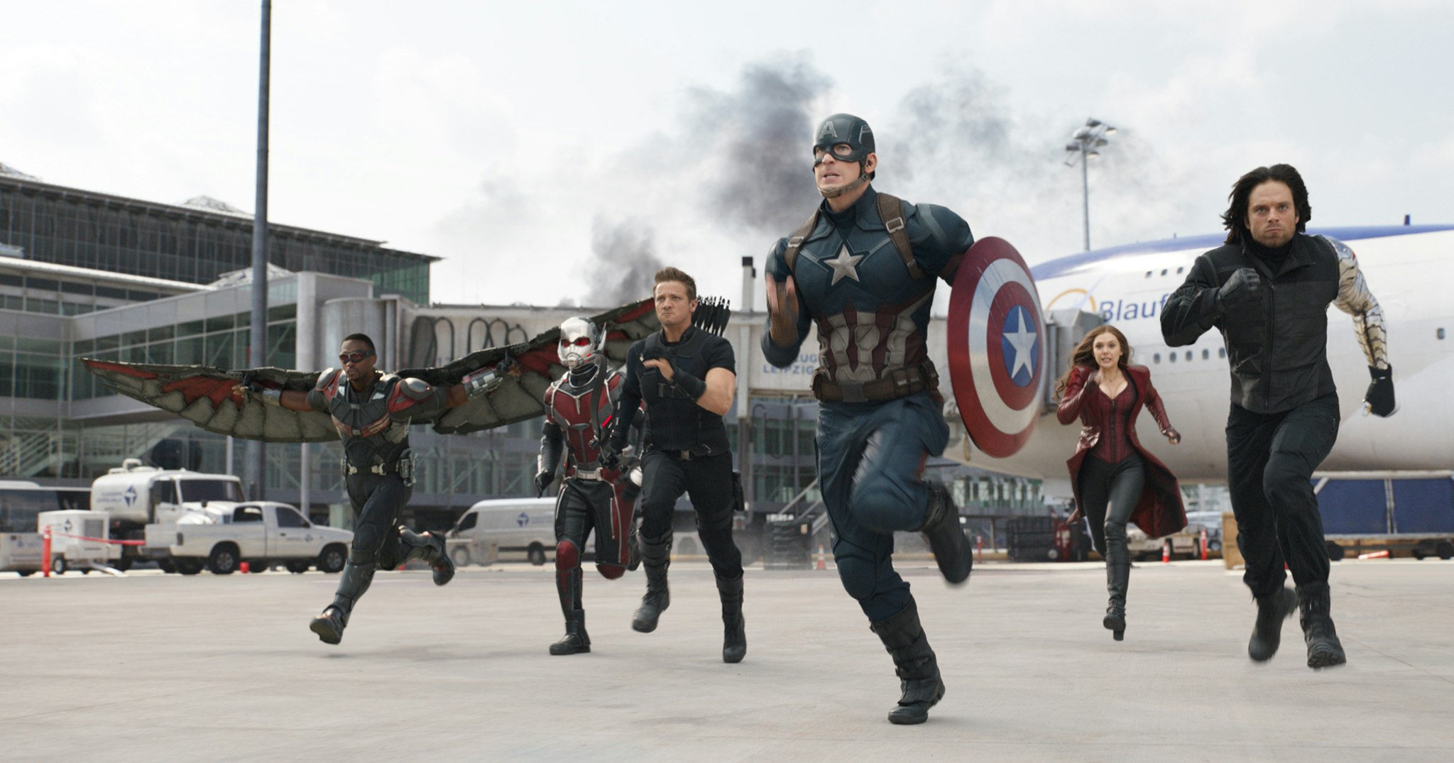 Falcon, Antman, Hawkeye, Captain America, Scarlet Witch, and The Winder Solider are running into battle at the airport base