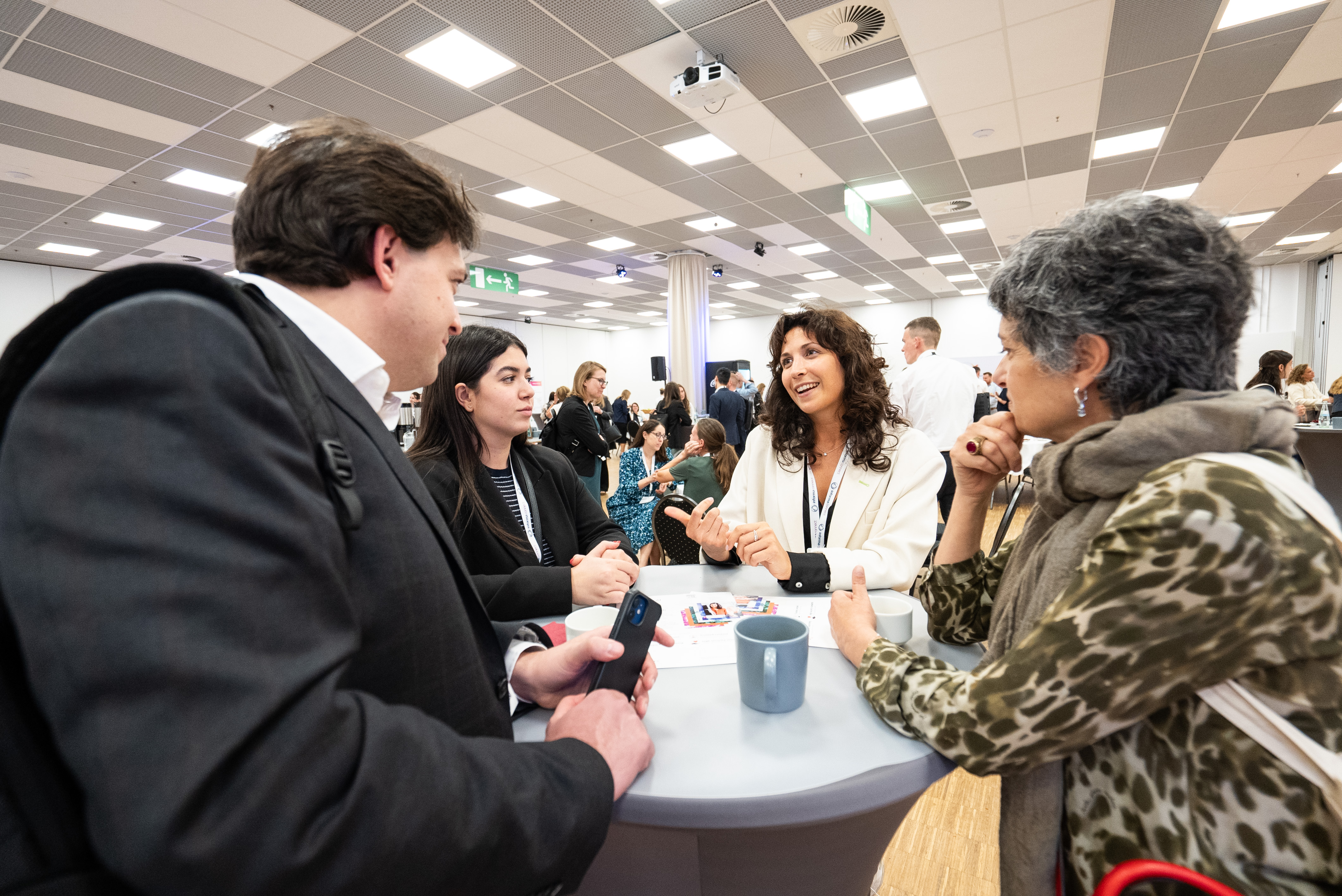MedTech professionals engaging in meaningful discussions during the networking break.