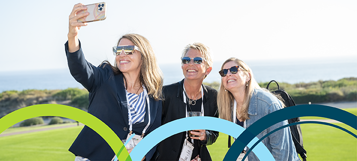 Retailers taking a selfi outside at our previous Outlook Leadership event.