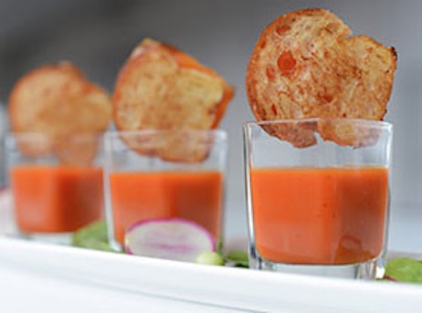 tomato soup in cups with bread