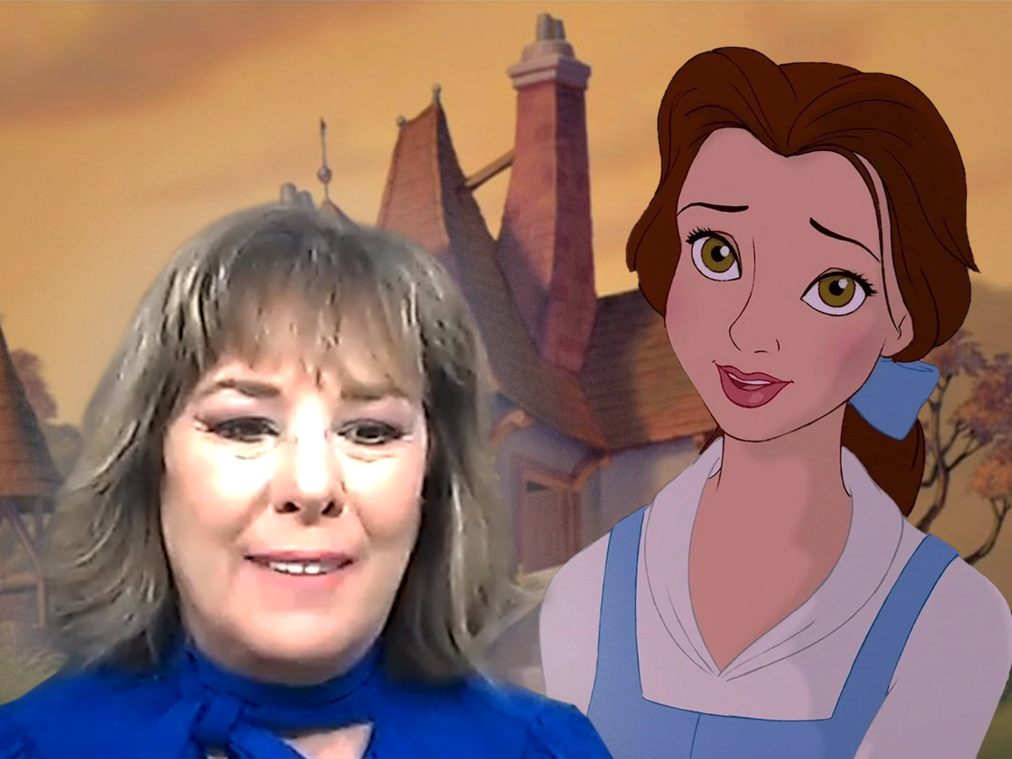 Paige O'Hara in a blue top overtop of a Belle from Beauty and the Beast still in her blue/white dress