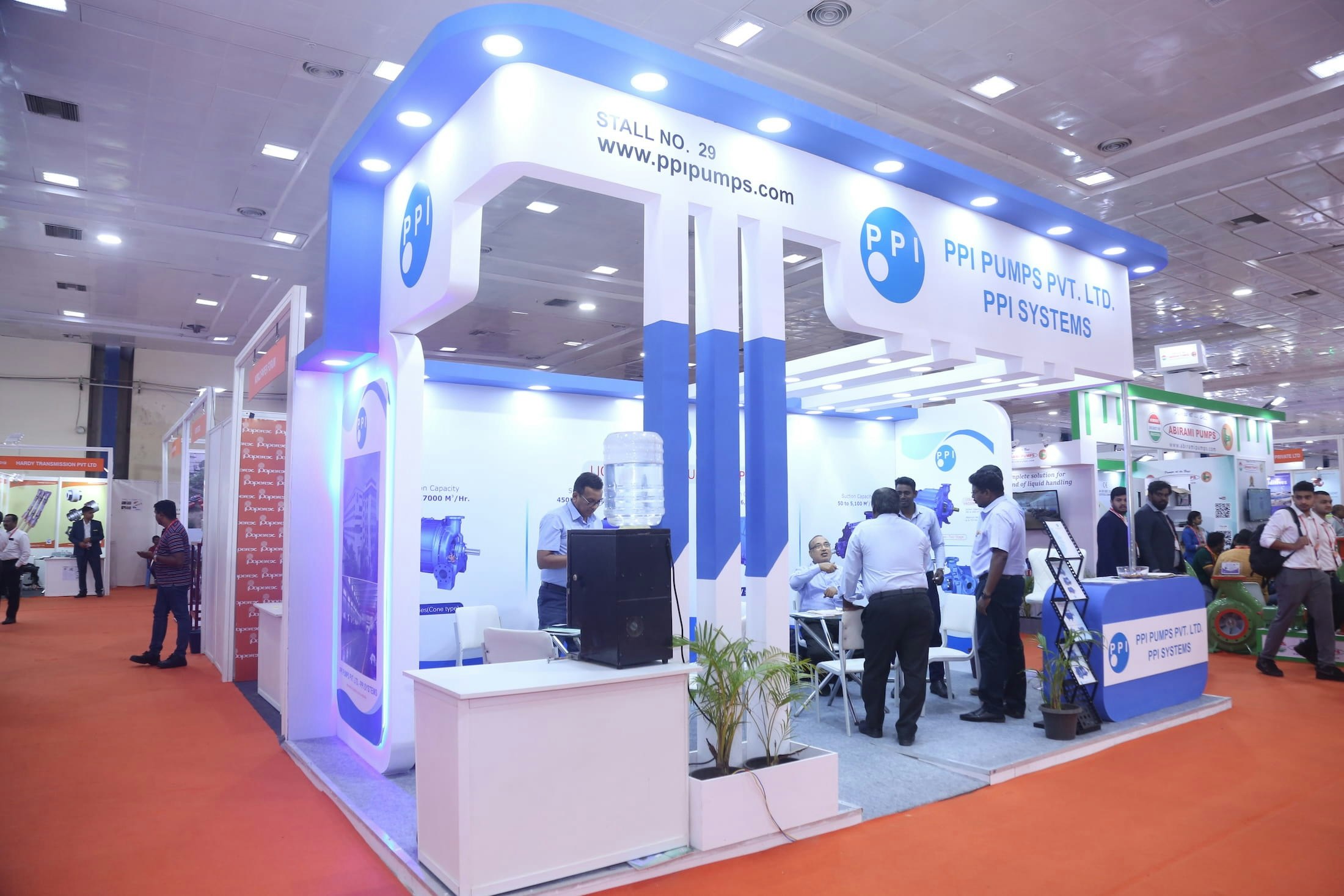 PPI Pumps exhibition booth at Paperex South India, featuring blue and white branding.