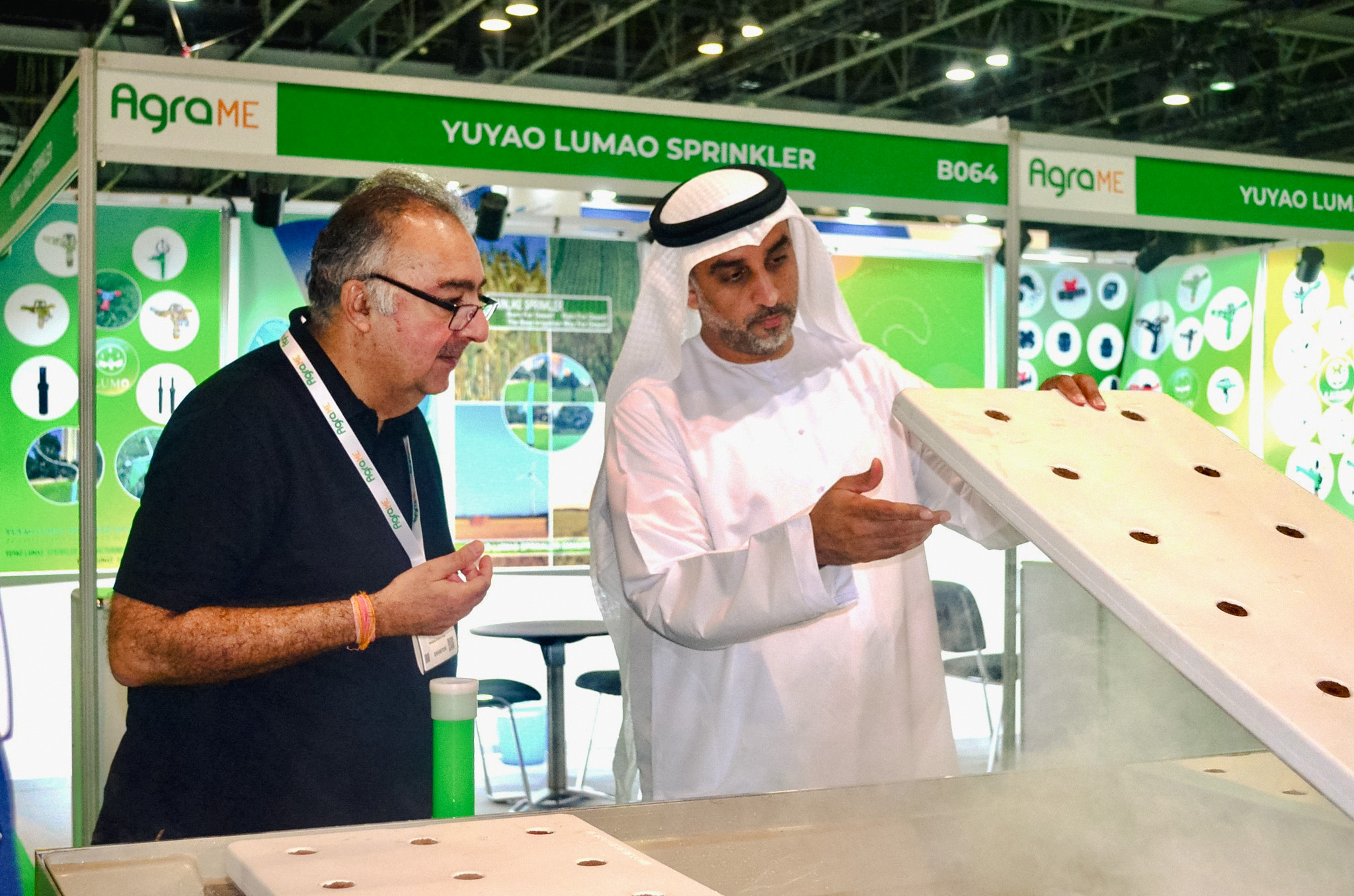 Exhibitors demonstrating irrigation and sprinkler technologies at Agra Middle East 2025 in Dubai, UAE, highlighting smart farming and agri-tech innovations.