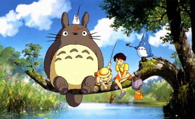 Seated on a long and bending tree branch, Totoro sits with his forest friends, as well as Mei and Satsuki, who are fishing in the river.