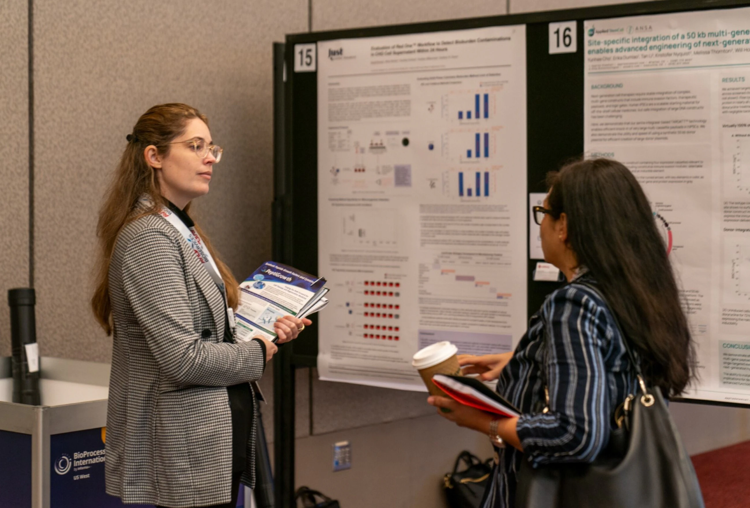 An attendee presents their post at BioProcess International US West