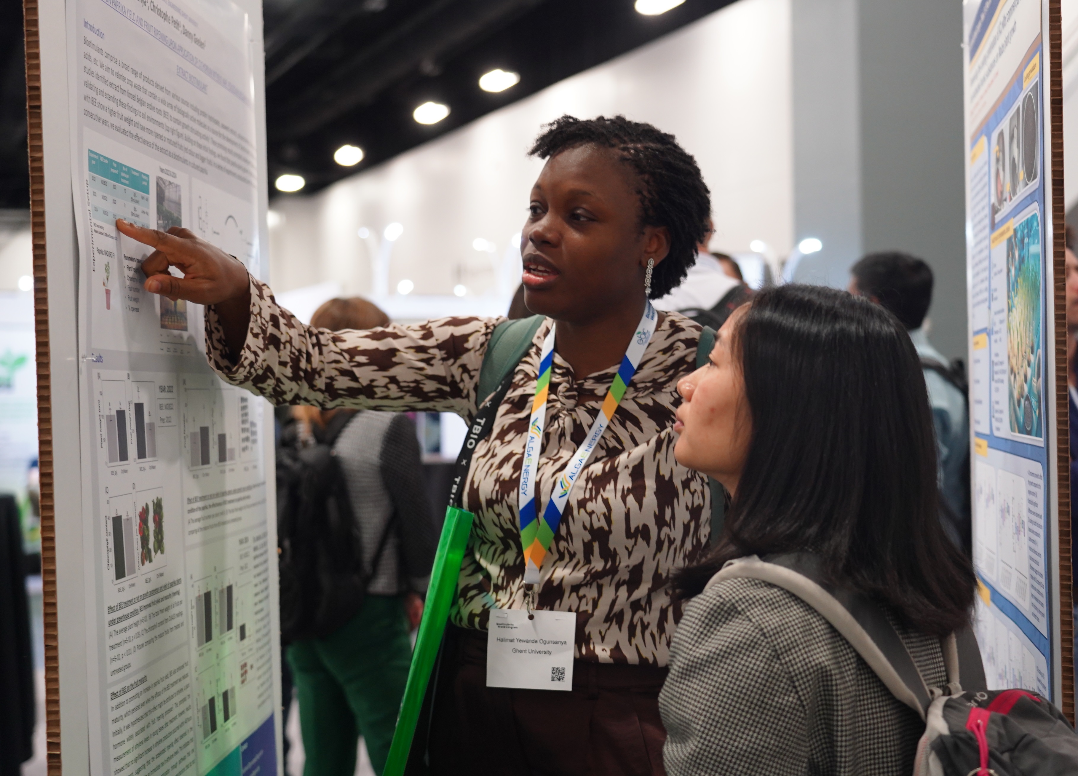 Two people discussing the content of a panel presentation during the panel tour in Miami 2024