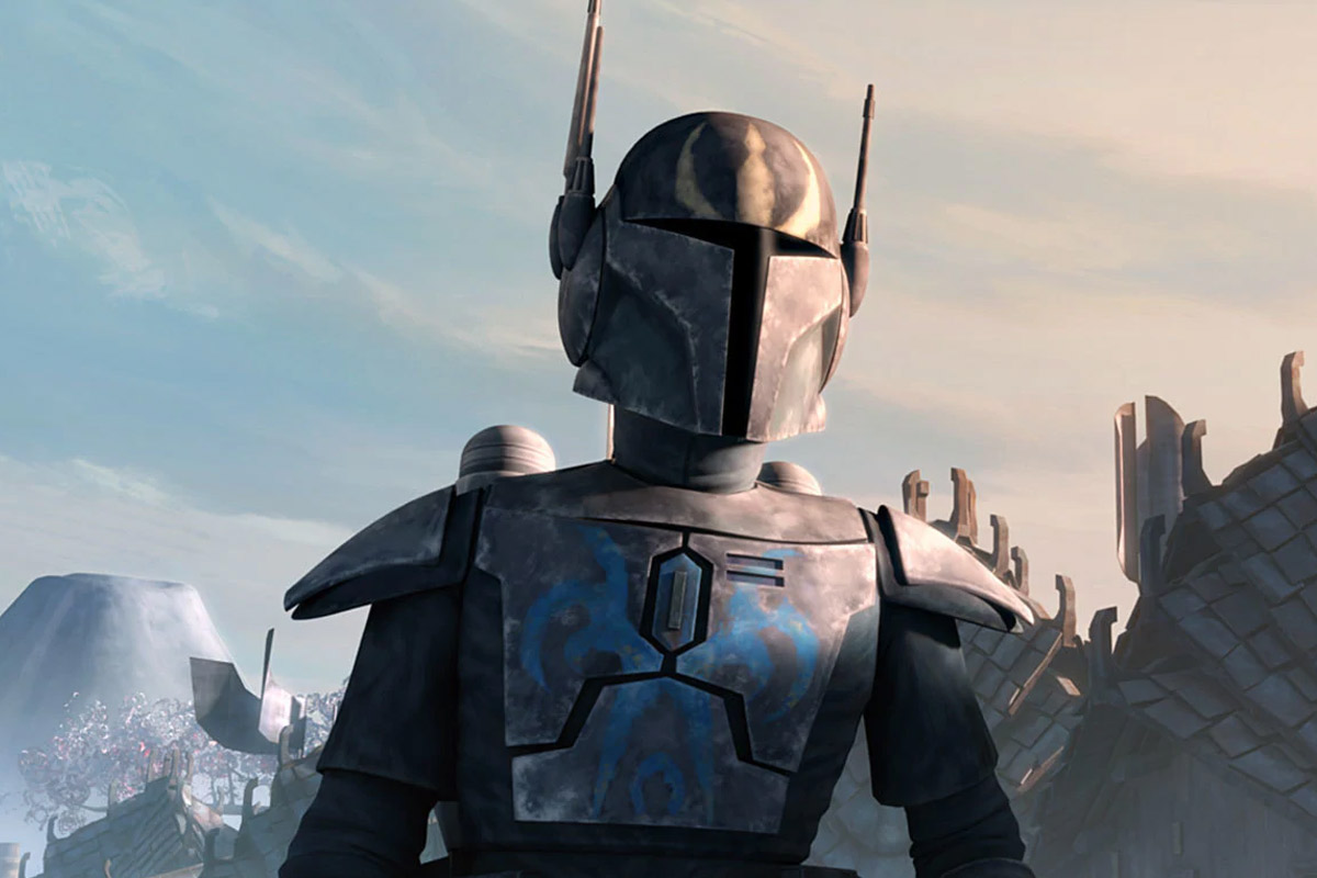 Pre-Vizla stands masked and looking at something with a mountain in the distance