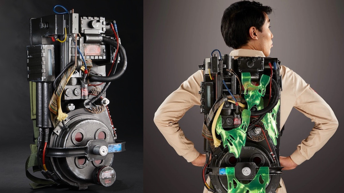 a side by side image: Left; a Proton Pack standing alone on a gray backdrop. Right; a model dressed as a ghostbuster wears the proton pack, dripping with green exctoplasm