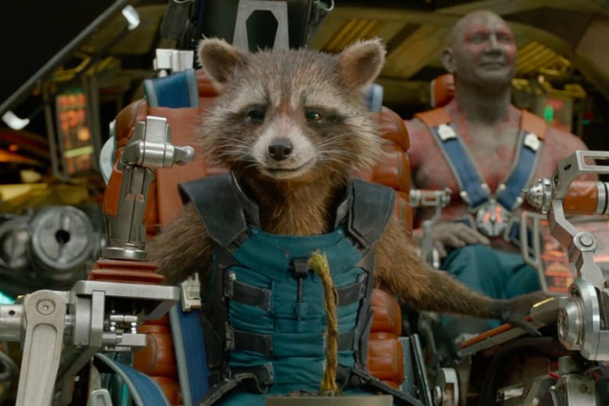 Rocket Raccoon sitting in the pilot seat aboard the Benatar