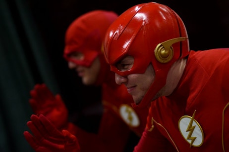 2 Flash cosplayers getting ready for a race