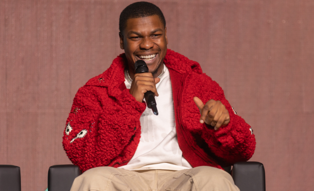 fans posing for photo in Star Wars ship installation