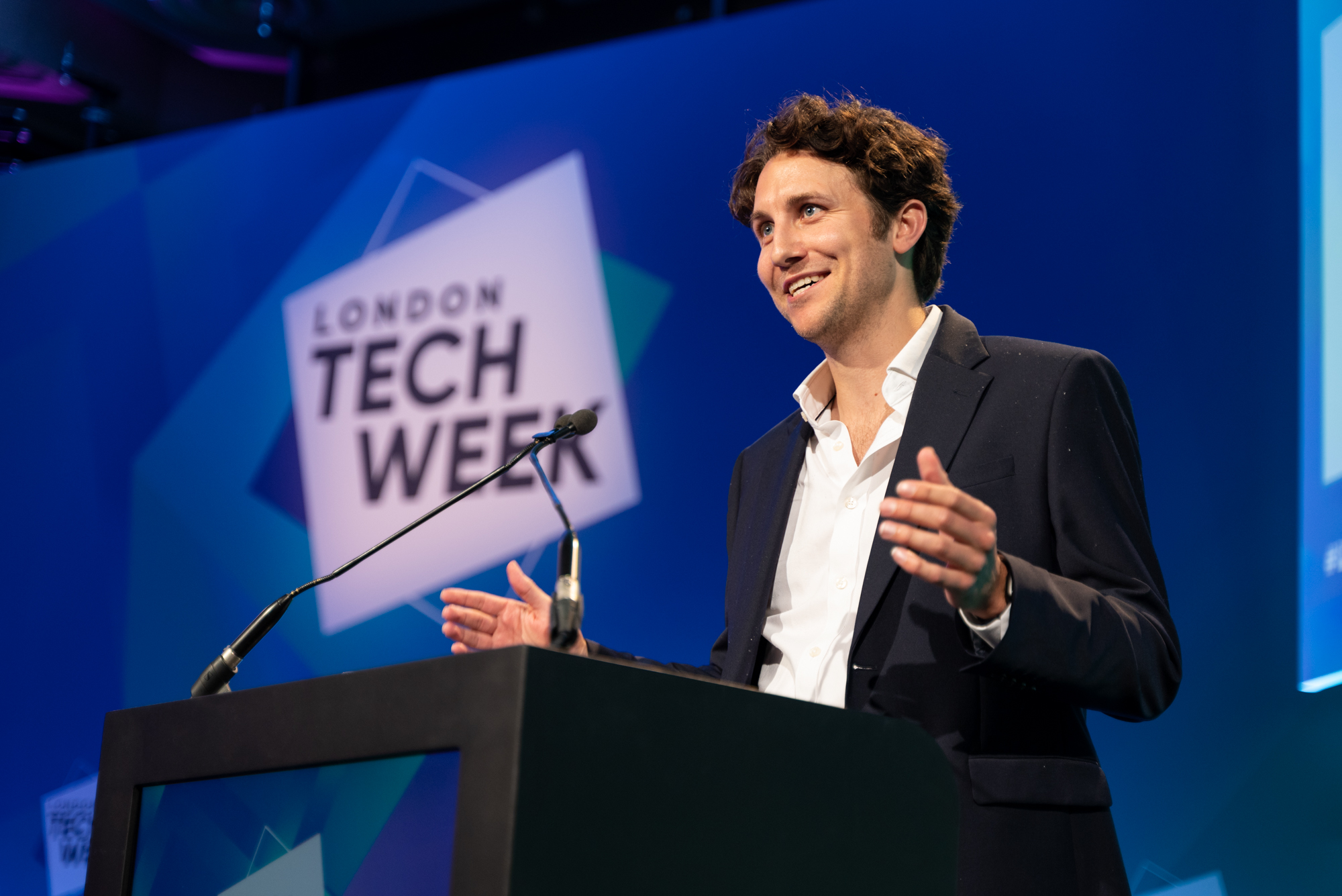 Host speaking on stage