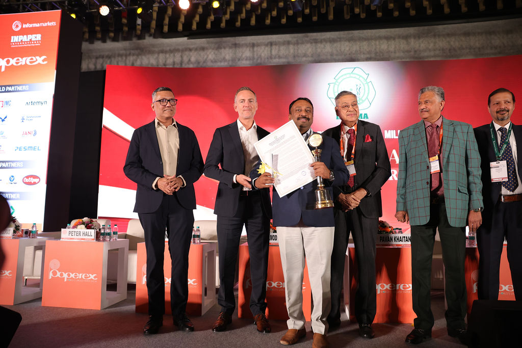 Attendees seated in rows at a conference or seminar event.