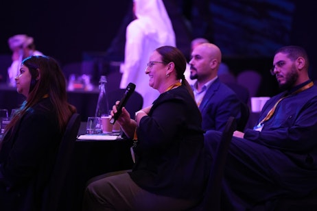 Interactive Q&A with delegates at HRSE Dubai 2025 workshops, focusing on leadership, coaching skills, and strategic HR development.