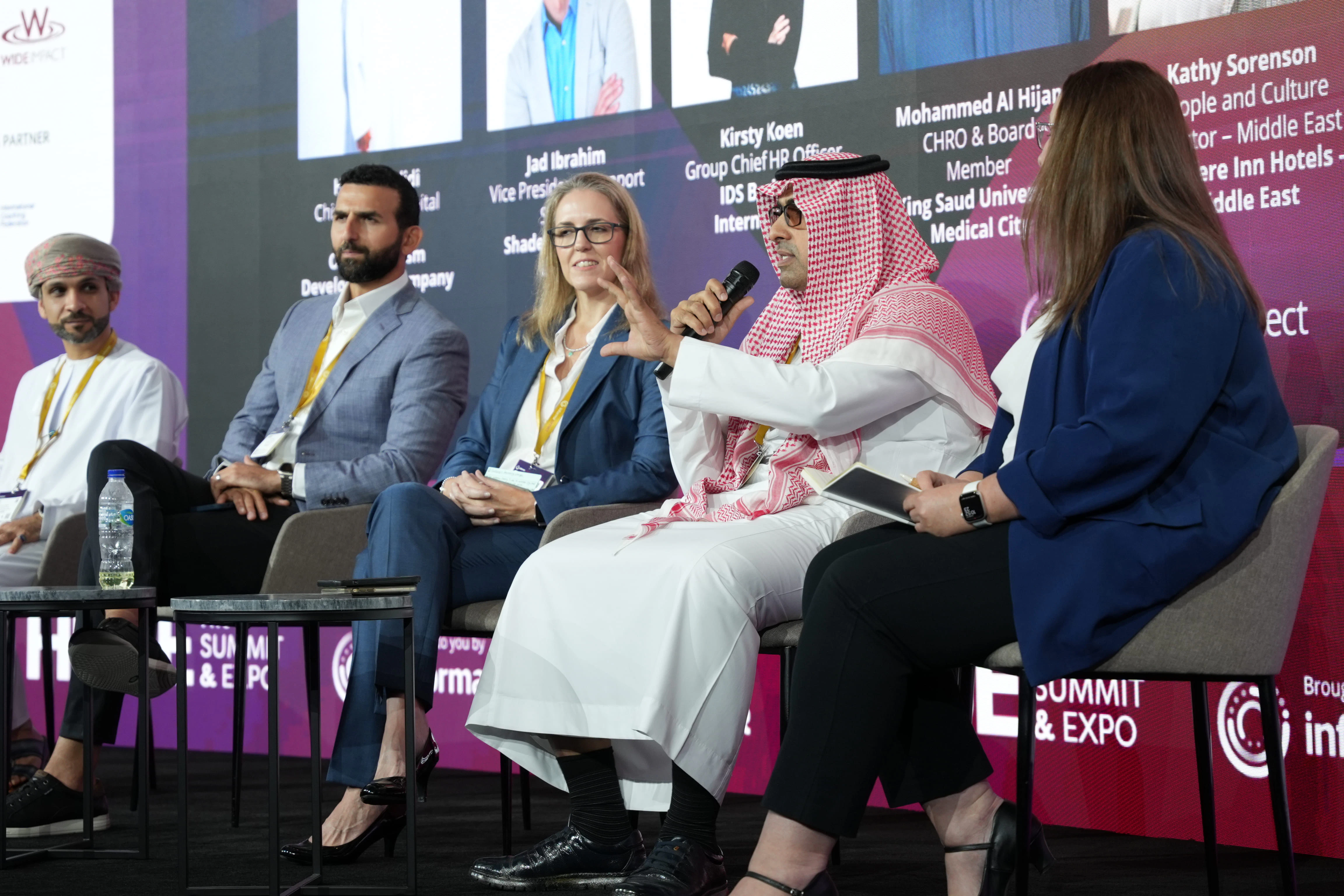 Diverse audience listening to a presenter at HRSE Egypt