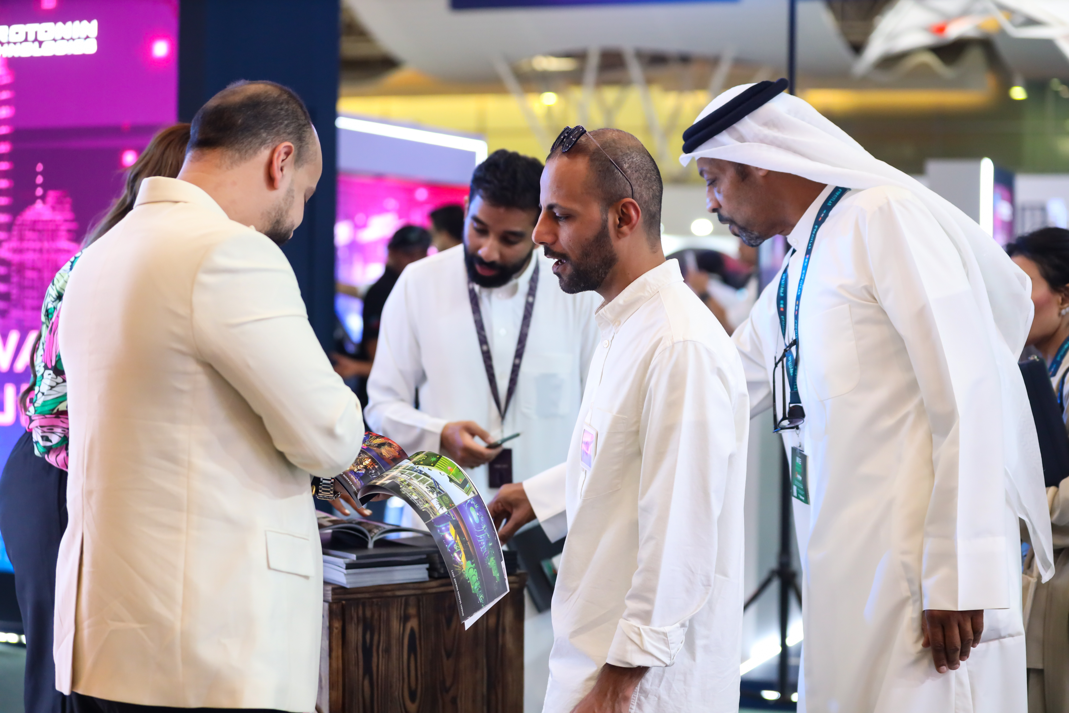 Attendees engaging with exhibitors showcasing immersive event technology at Saudi Event Show.