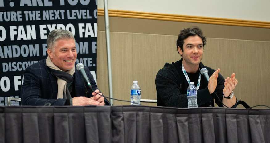 Anson and Ethan take fan questions - Etahn is mid clap as he cheers on a fan story