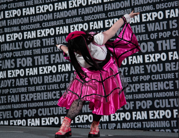 DracuLaura takes a bow for the audience as she walks the stage