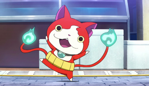 Jibanyan stands on the street, dancing. His hands are raised and he is standing on one foot.