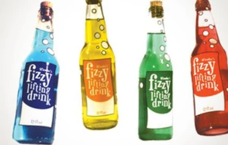 four animated glass bottles in a row, all with a "Fizzy Lifting Drink" label. From left to right there is Blue, Yellow, Green, and Red.