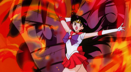Sailor Mars, surrounded by fire, stands and prepares to attack. The image of her full body stands in front of a silhouette of eyes.