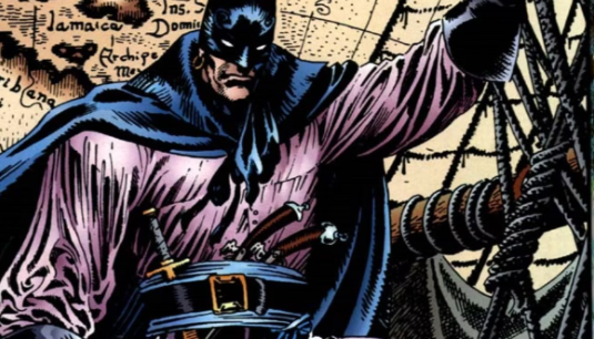 Captain Leatherwing holds the post of his shap as it sails. He wears his pirate gear as well as his Batman gear.