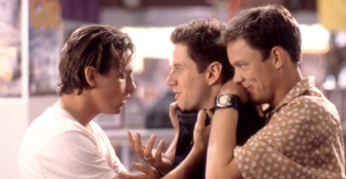 Stu and Billy hold Randy threateningly as they accuse him of the heinous acts being committed in Woodsboro.