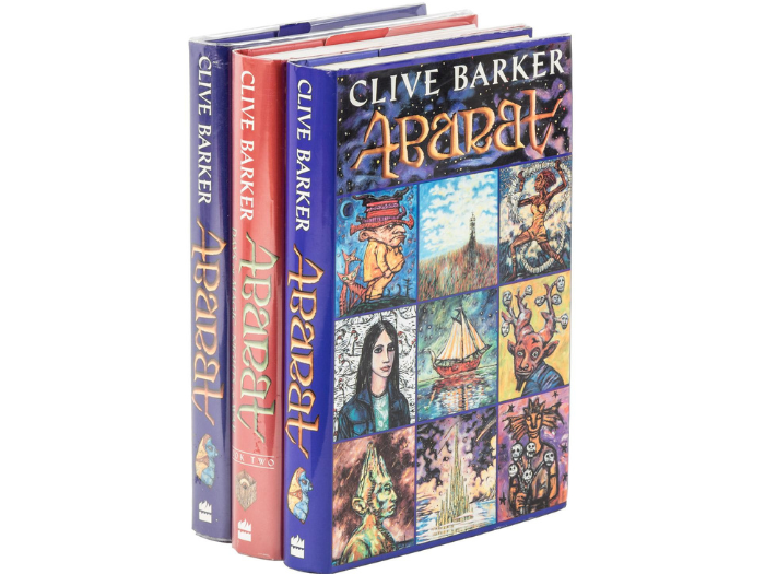 A stack of Abarat books stand together on their own surrounded by a white background