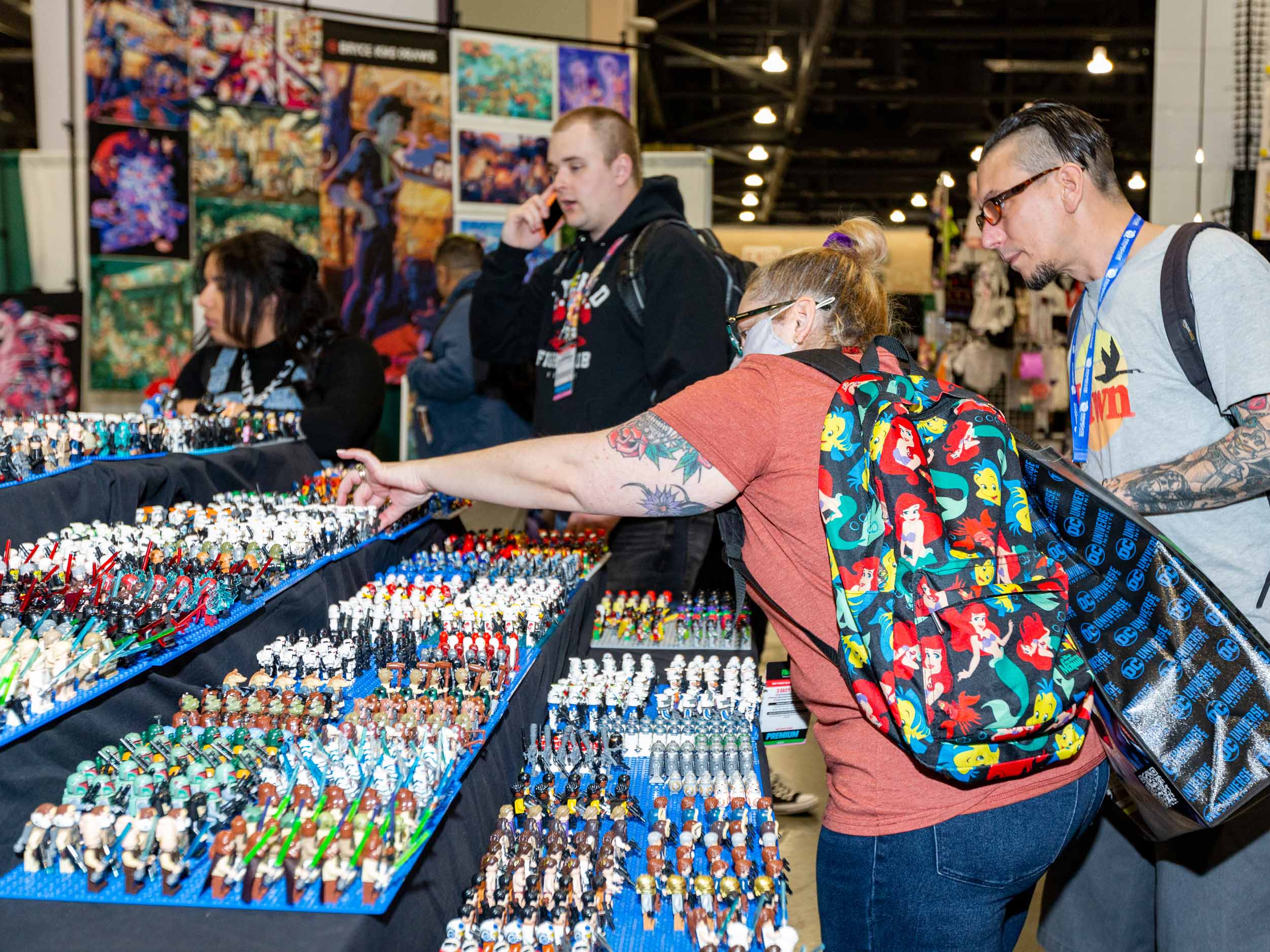 A guest buying some knock-off Star Wars Lego minifigures