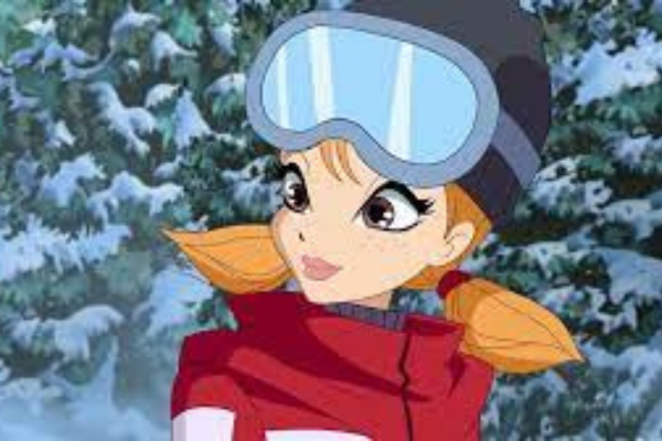 Silke, wearing her red hair in low pigtails in snow goggles, a parka and a hat, is looking of to the side of the screen. Behing her is a forest of snowy trees.