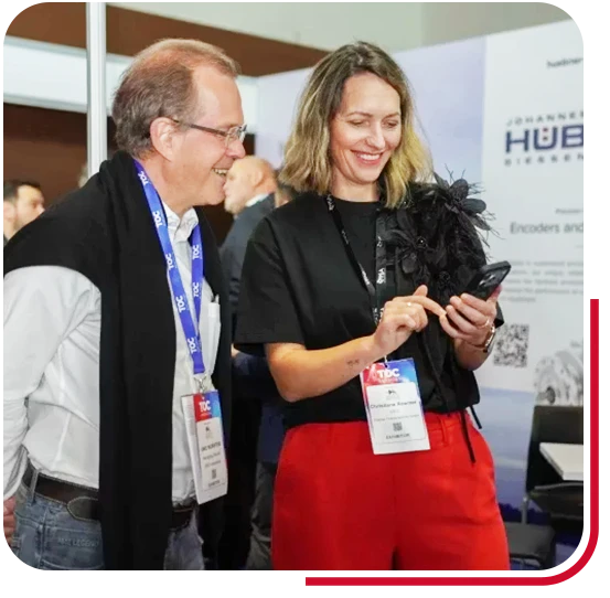 Visitor at exhibitor booth - TOC Americas conference