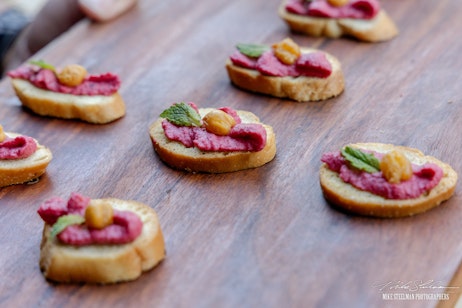 Mini toast with pink sauce