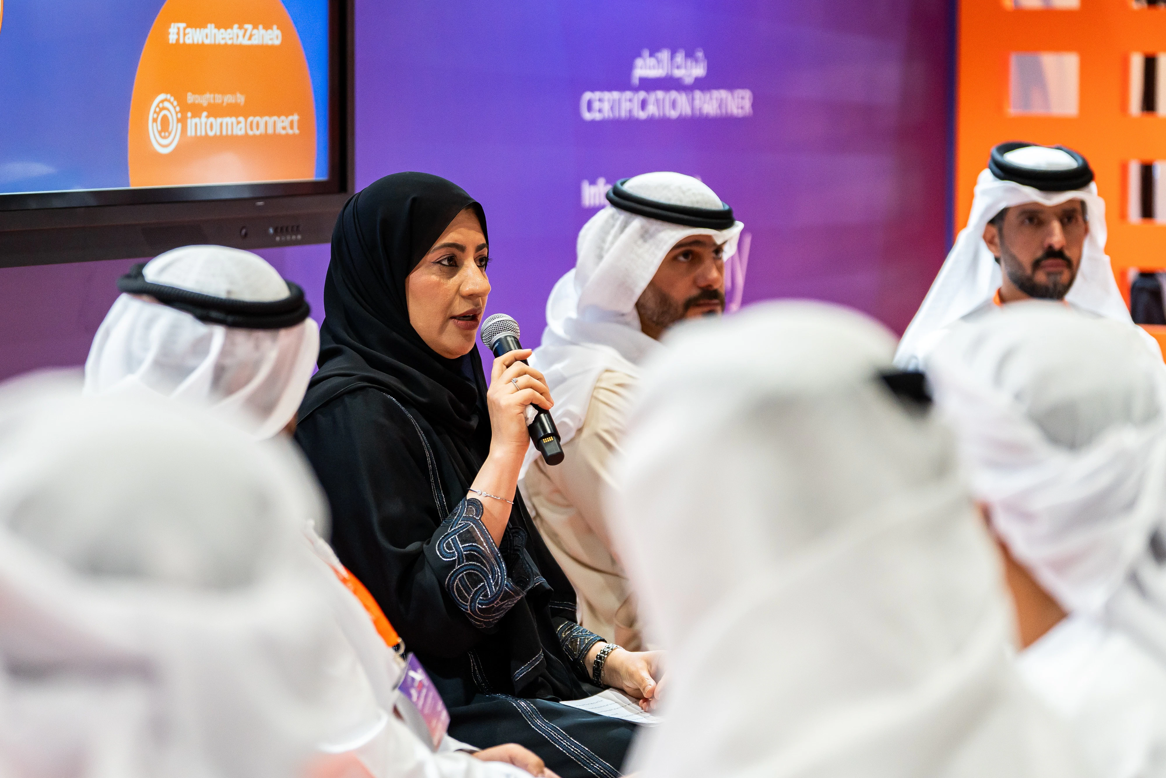 Emirati jobseekers meeting hiring managers at Tawdheef x Zaheb 2025 in Abu Dhabi, exploring new career opportunities