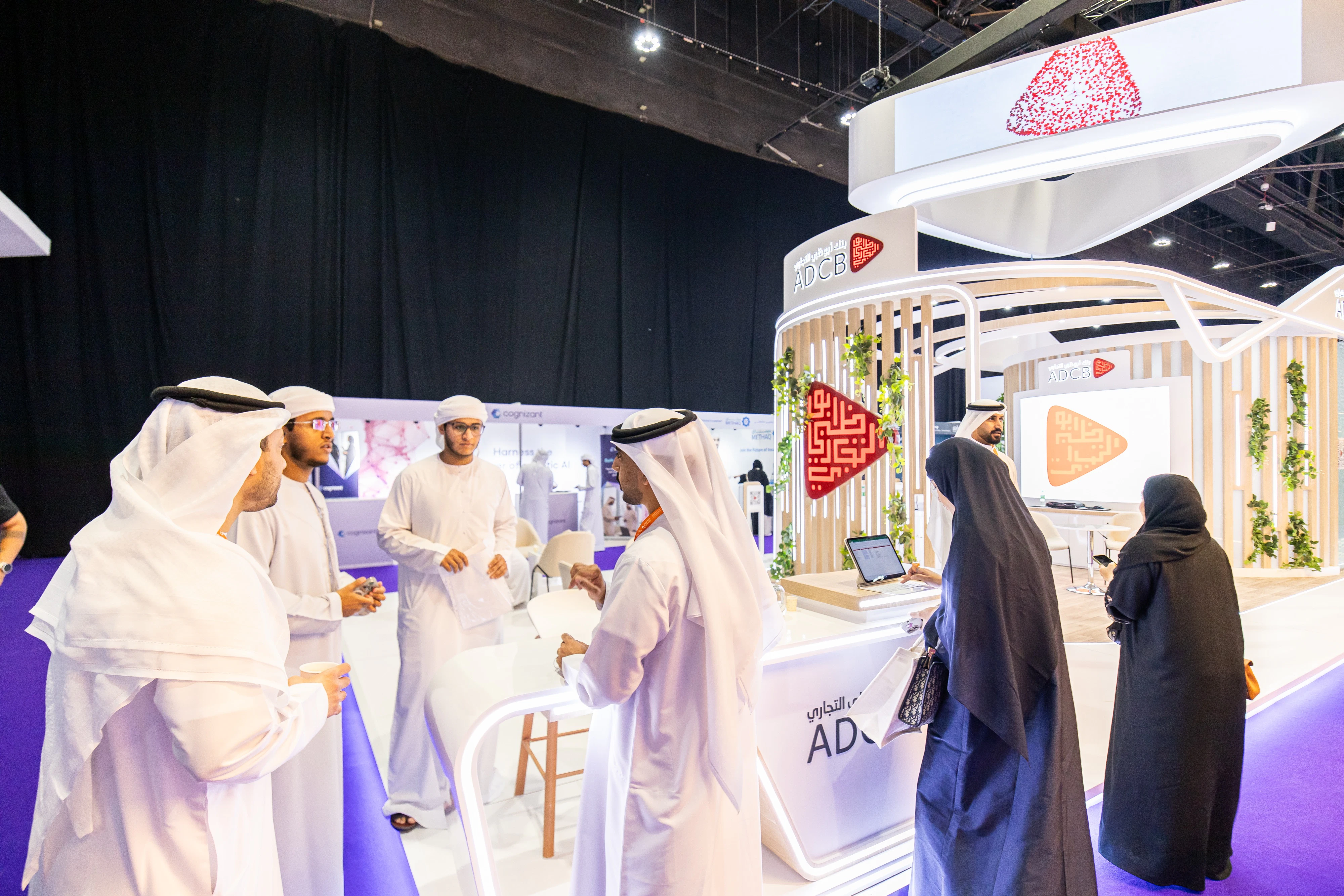Emirati jobseekers meeting hiring managers at Tawdheef x Zaheb 2025 in Abu Dhabi, exploring new career opportunities